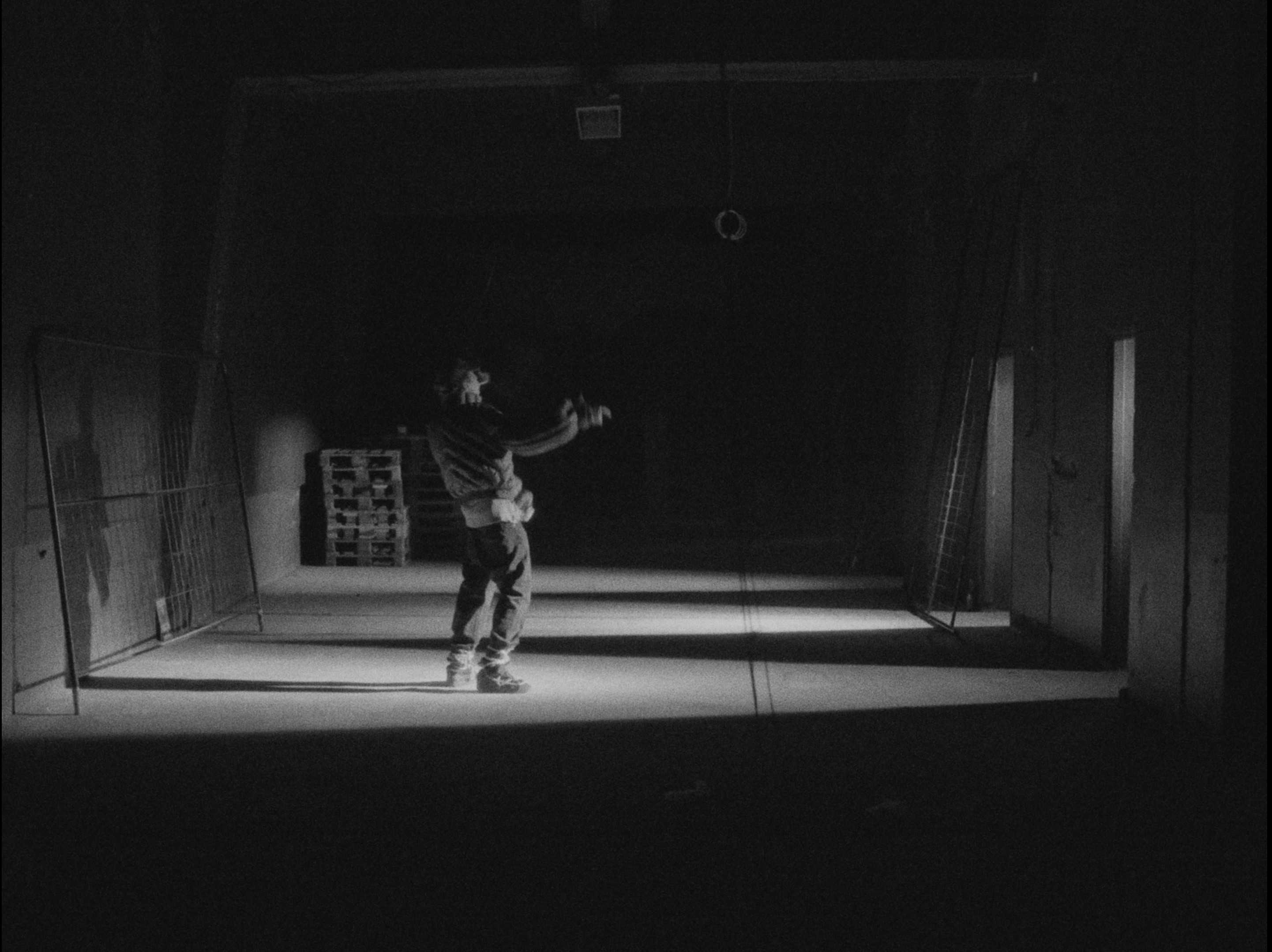 Woman with sunglasses walking down runway